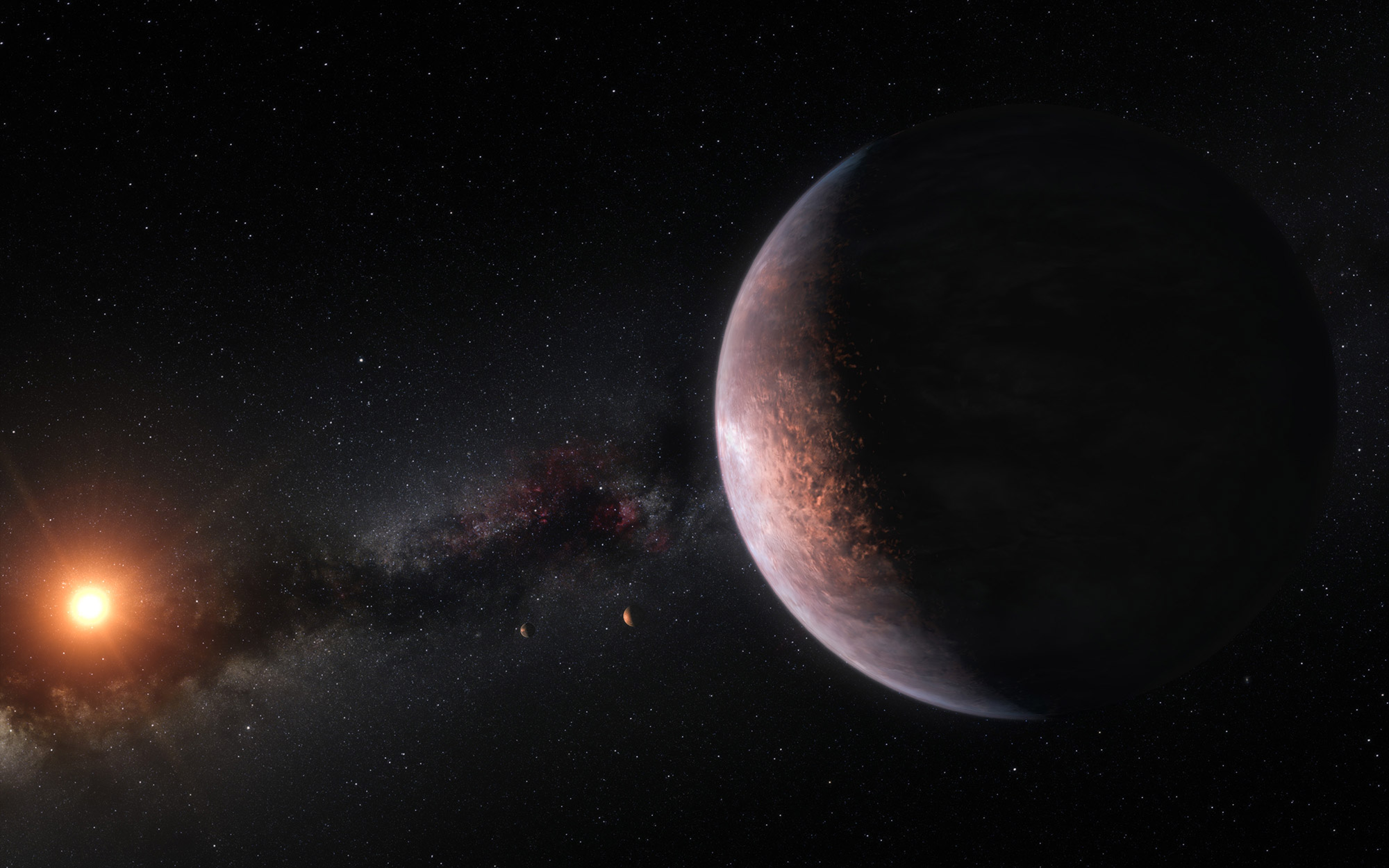 Représentation du système Trappist-1, situé à 40,5 années-lumière de la Terre. Le nouveau système planétaire découvert possède aussi une forte probabilité d'abriter de la vie extraterrestre.&nbsp;© ESO