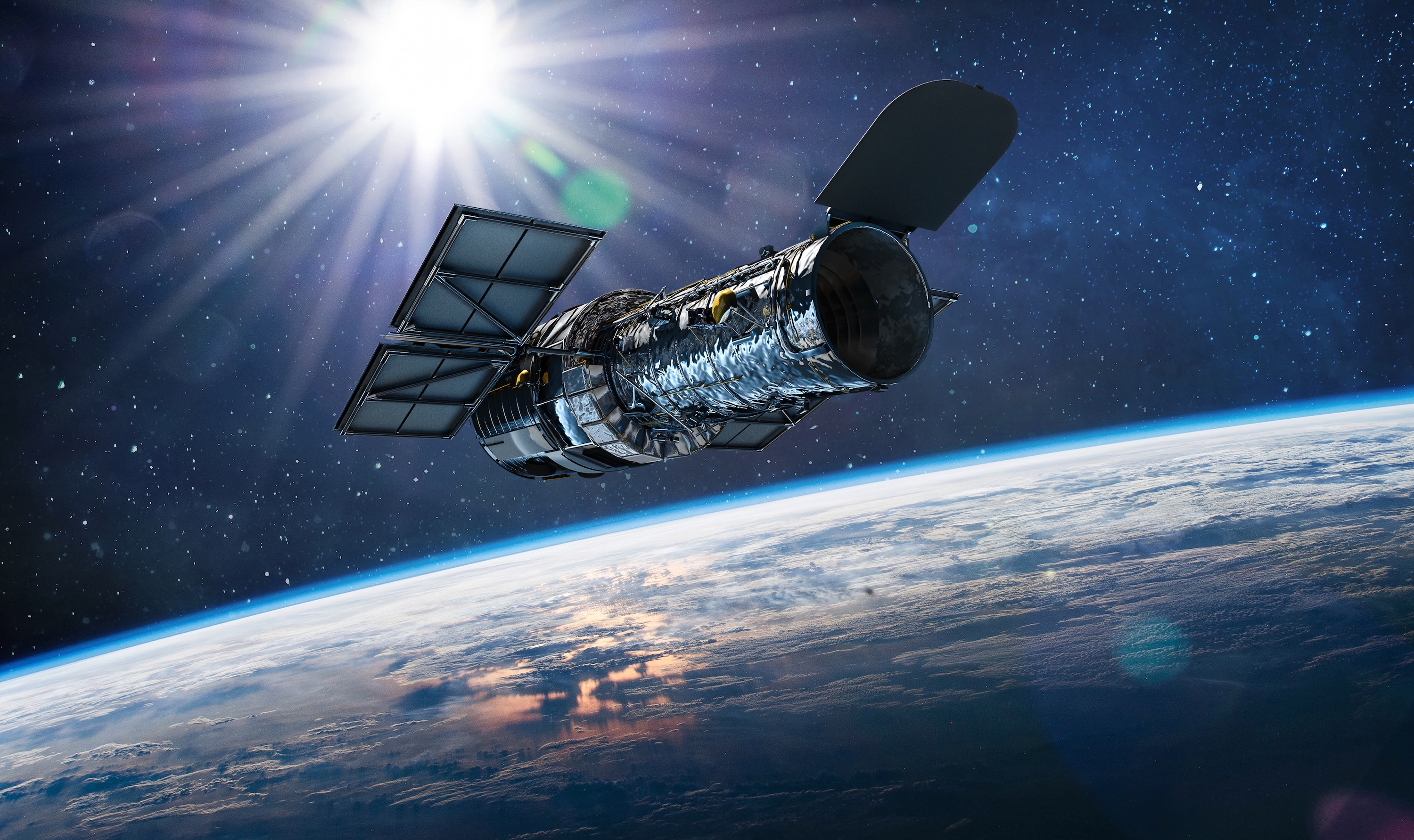 Le télescope spatial Hubble en orbite autour de la Terre à environ 500 kilomètres. © dimazel, Adobe Stock