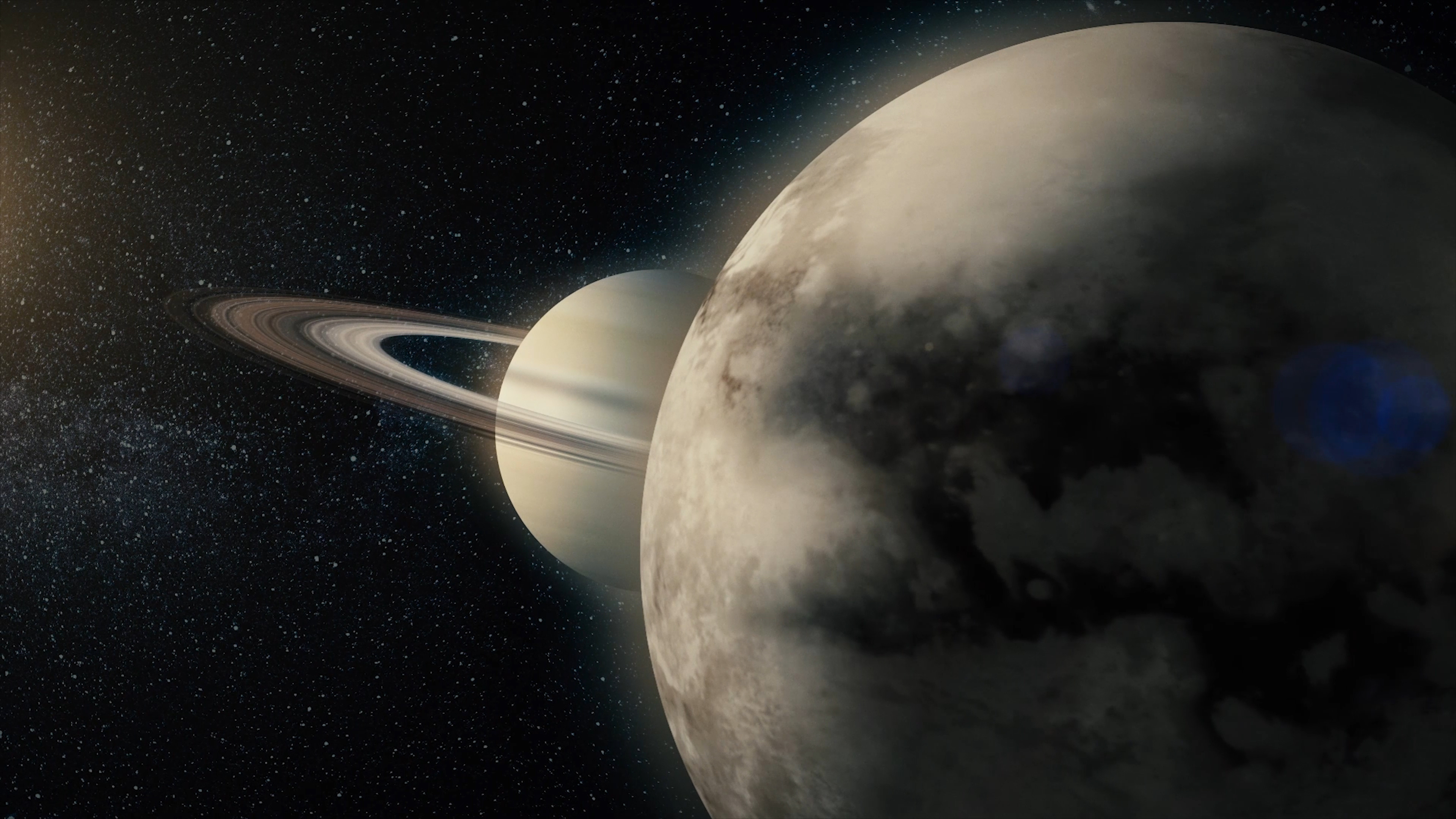 Représentation de Saturne et de sa lune Titan. © Media Whalestock, Adobe Stock