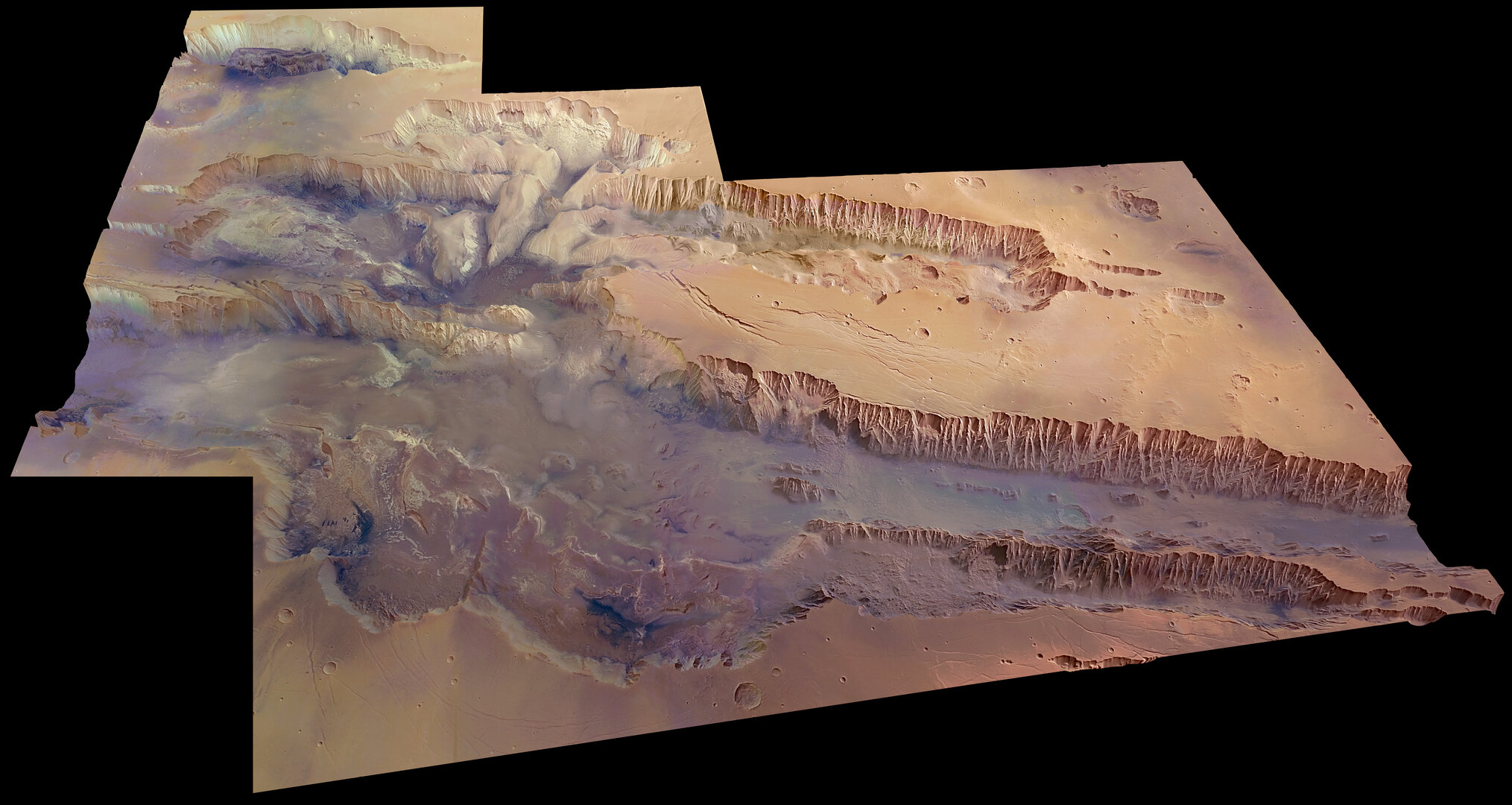 Valles Marineris, vu à un angle de 45 degrés par rapport à la surface dans des couleurs presque vraies et avec une exagération des hauteurs d'un facteur quatre. L'image couvre une superficie de 630.000 km² avec une résolution au sol de 100 mètres par pixel. La plus grande partie du canyon, qui s'étend sur toute l'image, est connue sous le nom de Melas Chasma. Candor Chasma est le creux&nbsp; immédiatement au nord.&nbsp;© ESA/DLR/FU Berlin (G. Neukum), CC by-sa 3.0 IGO&nbsp;&nbsp;