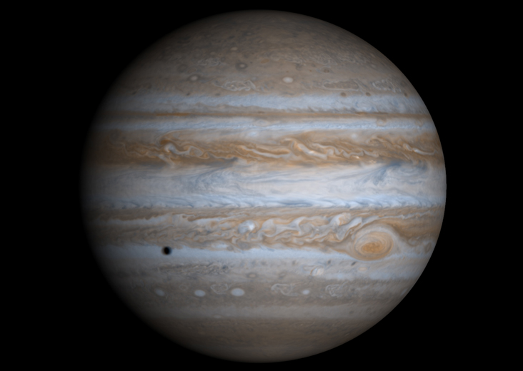 Jupiter, à côté de Tyché, serait sans doute une petite planète. Sur cet astre lointain, la chaleur interne pourrait, encore aujourd'hui, lui éviter d'être congelée. © Nasa/JPL/University of Arizona