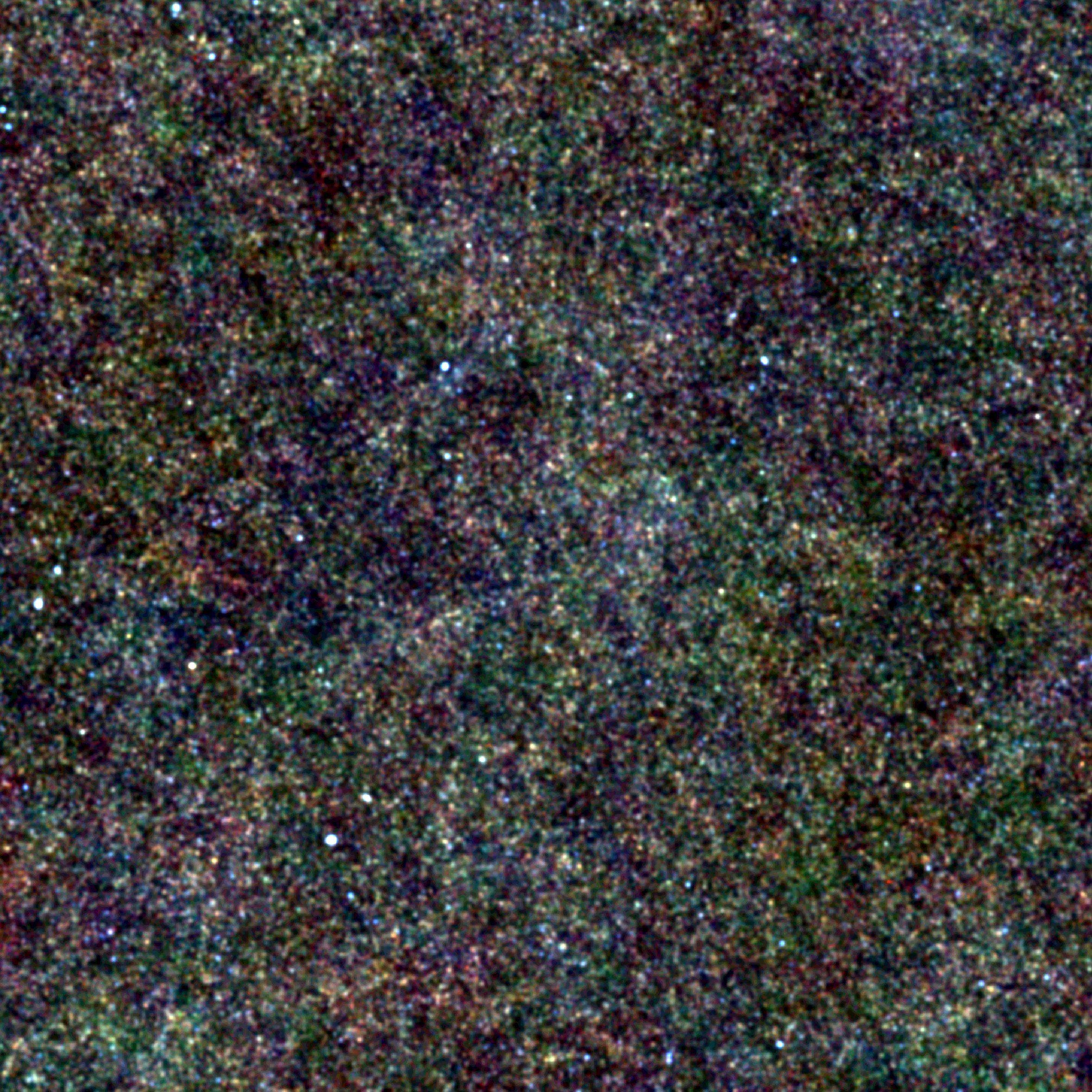 Le trou de Lockman est une région de la Voie lactée située dans la constellation de la Grande Ourse qui est presque libre de l'absorption des rayons X par le gaz d'hydrogène neutre. Il doit son nom à son découvreur, l'astronome Félix Lockman. Il a permis à Herschel d'observer des galaxies telles qu'elles étaient il y a 10 à 12 milliards d'années. On voit ici ces galaxies sous forme de points. © Esa & SPIRE consortium & Hermes consortium