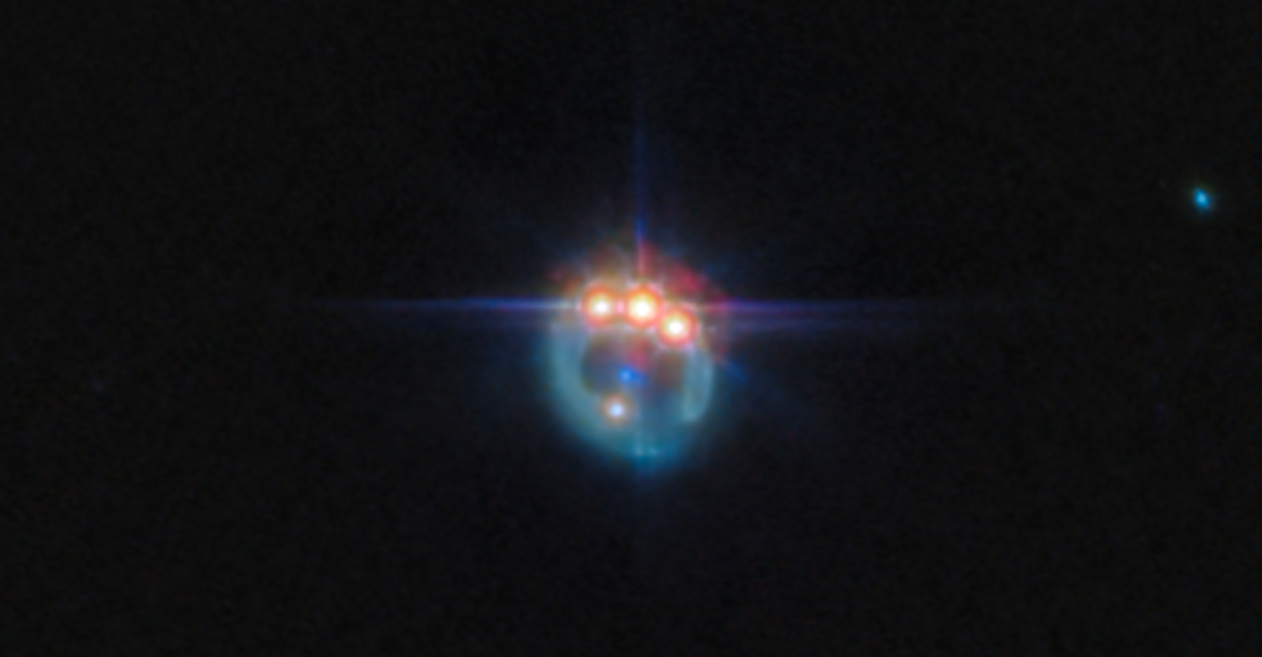 Cette image renvoyée par le télescope spatial James-Webb (JWST) est celle d’un quasar lointain déformé par effet de lentille gravitationnelle en une bague ornée de trois pierres précieuses scintillantes. © ESA, Webb, Nasa &amp; CSA, A. Nierenberg