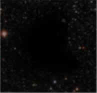 Ici,un nuage de matière noire masque la lumière émise par derrière