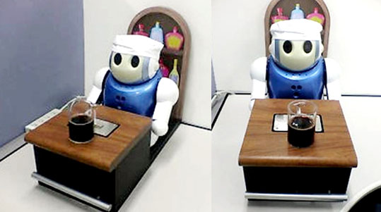 Le robot-sommelier de Nec. Anthropoïde en apparence mais très différent de la manière dont un humain procède... © Nec