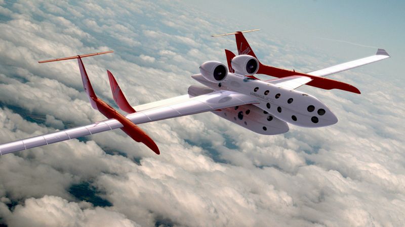Le Space Ship Two de Virgin Galactic sous son avion porteur, projet de Richard Branson, qui débutera ses vols touristiques suborbitaux l'an prochain. Crédit Virgin Galactic.