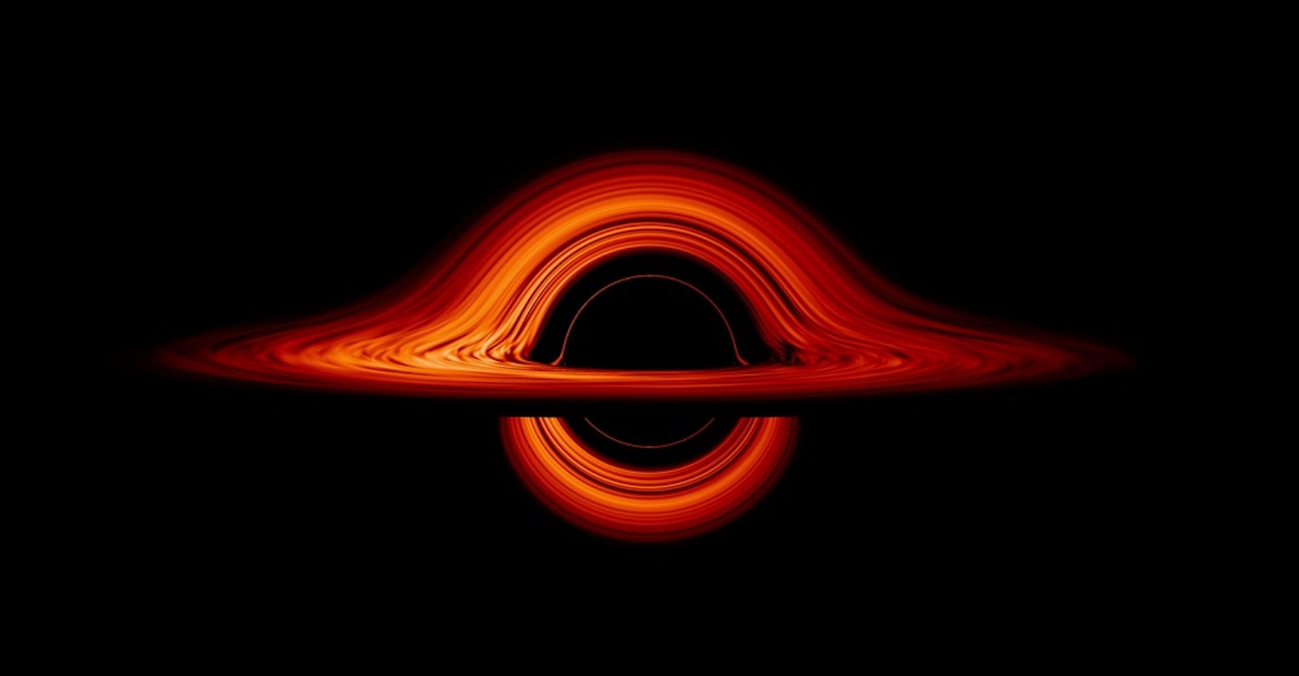 Une simulation de la Nasa montre comment un trou noir peut déformer l’espace-temps dans ses environs. © Jeremy Schnittman, Nasa’s Goddard Space Flight Center