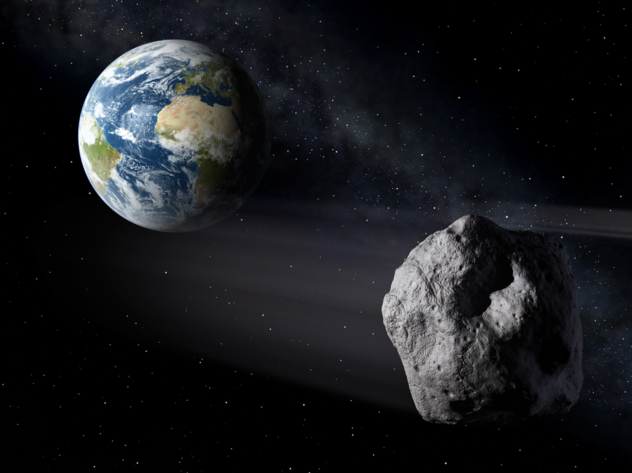 Illustration d’un astéroïde passant dans le voisinage de la Terre. © P. Carril, ESA