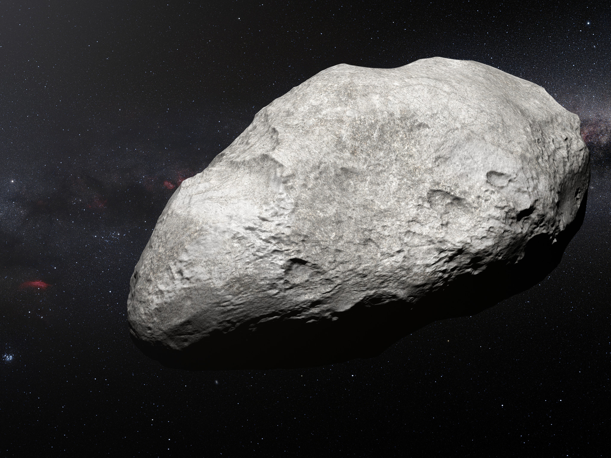 Sur cette vue d’artiste figure l’astéroïde en exil 2004 EW95, le tout premier astéroïde riche en carbone dont l’existence au sein de la ceinture de Kuiper a été confirmée et qui constitue un vestige du Système solaire primordial. Cet étrange objet s’est probablement formé dans la ceinture d’astéroïdes située entre Mars et Jupiter puis s’est déplacé sur des milliards de kilomètres jusqu’à atteindre son lieu de résidence actuel, la ceinture de Kuiper. © ESO/M. Kornmesser