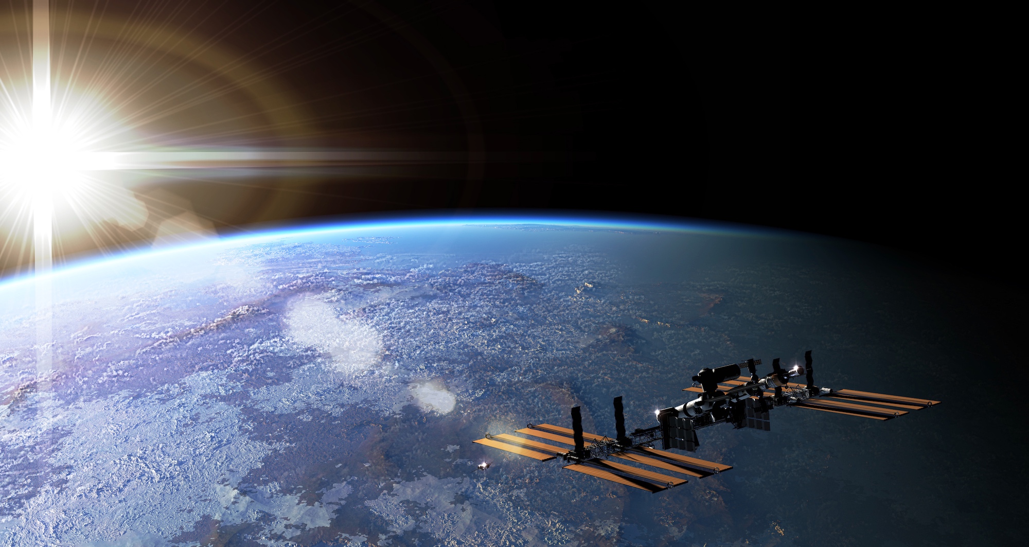 Montage photo de la Station spatiale au-dessus de la Terre. © Mechanik, Adobe Stock