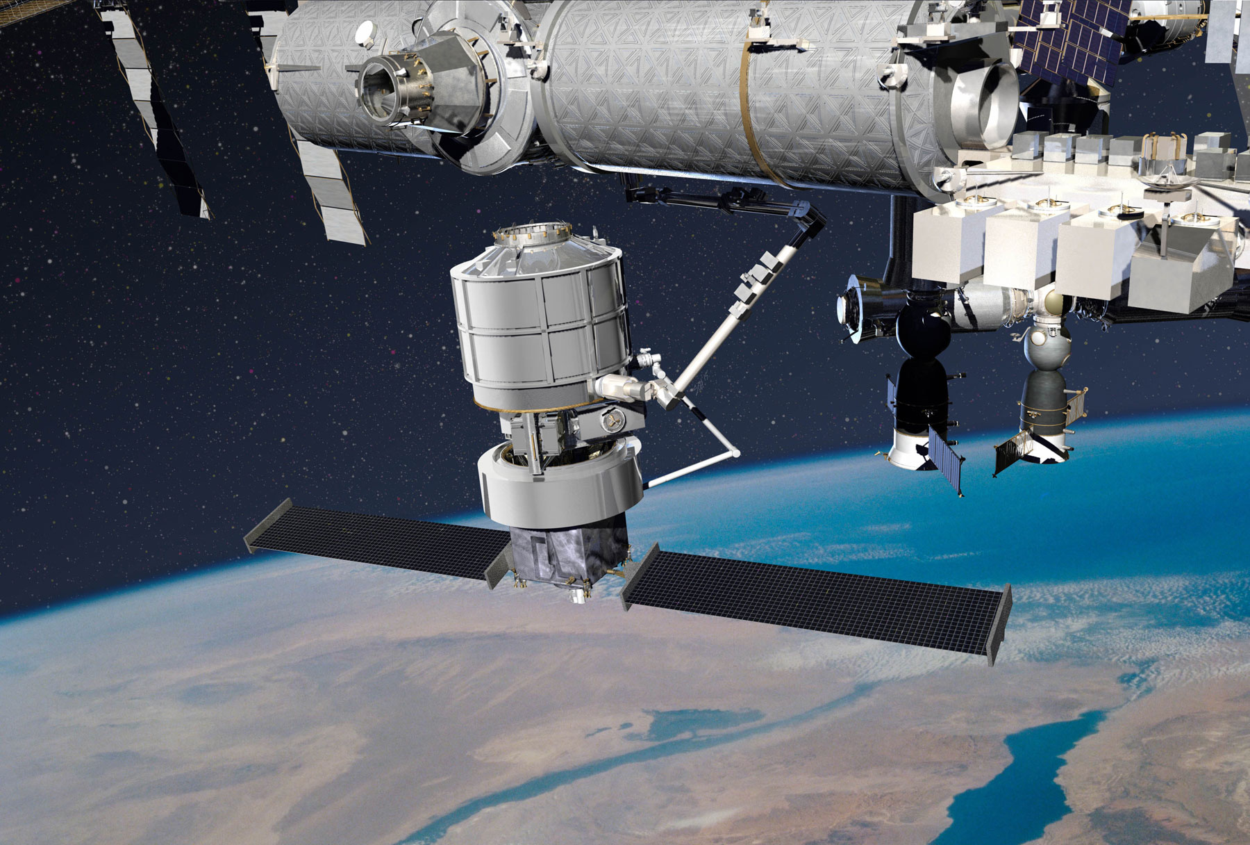 L'Exoliner amené à l'ISS par le Jupiter et amarré au complexe orbital par le bras de l'ISS. © Lockheed Martin