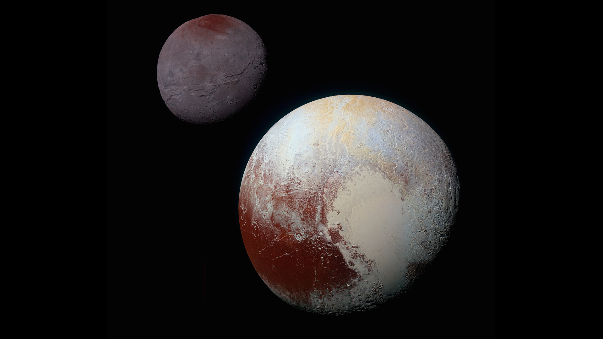 Vue globale de Pluton et Charon lors de la visite historique de la sonde New Horizons. © Nasa, SwRI, JHUAPL