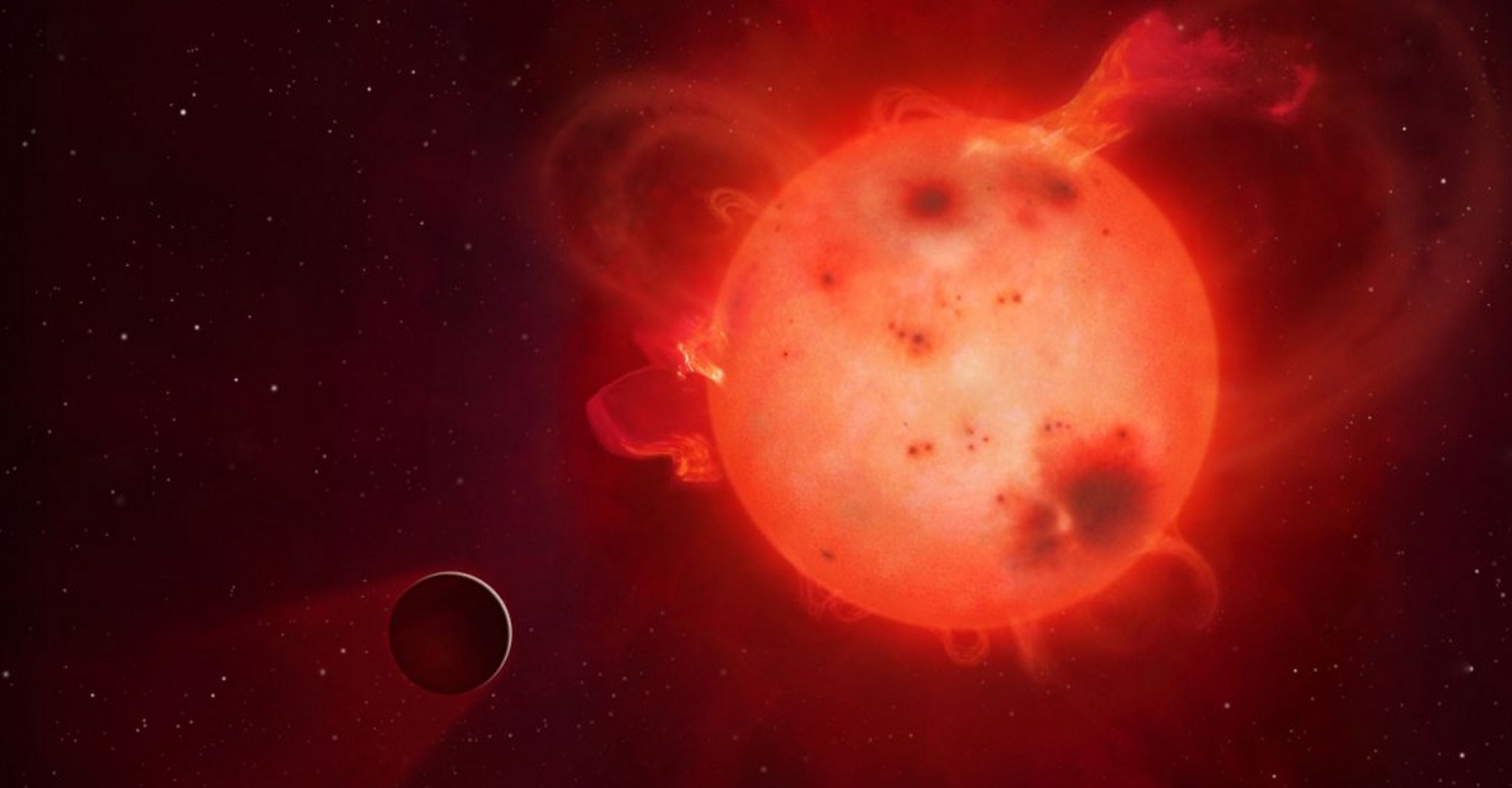 L'exoplanète Kepler-438b (représentée ici dans une vue d'artiste) ressemble beaucoup à la Terre mais elle tourne, à faible distance, autour d'une naine rouge paraissant assez colérique. La vie est-elle possible tout près de ces petites étoiles, largement majoritaires ? Des modèles climatiques répondent oui, mais à certaines conditions. © Mark A. Garlick, university of Warwick
