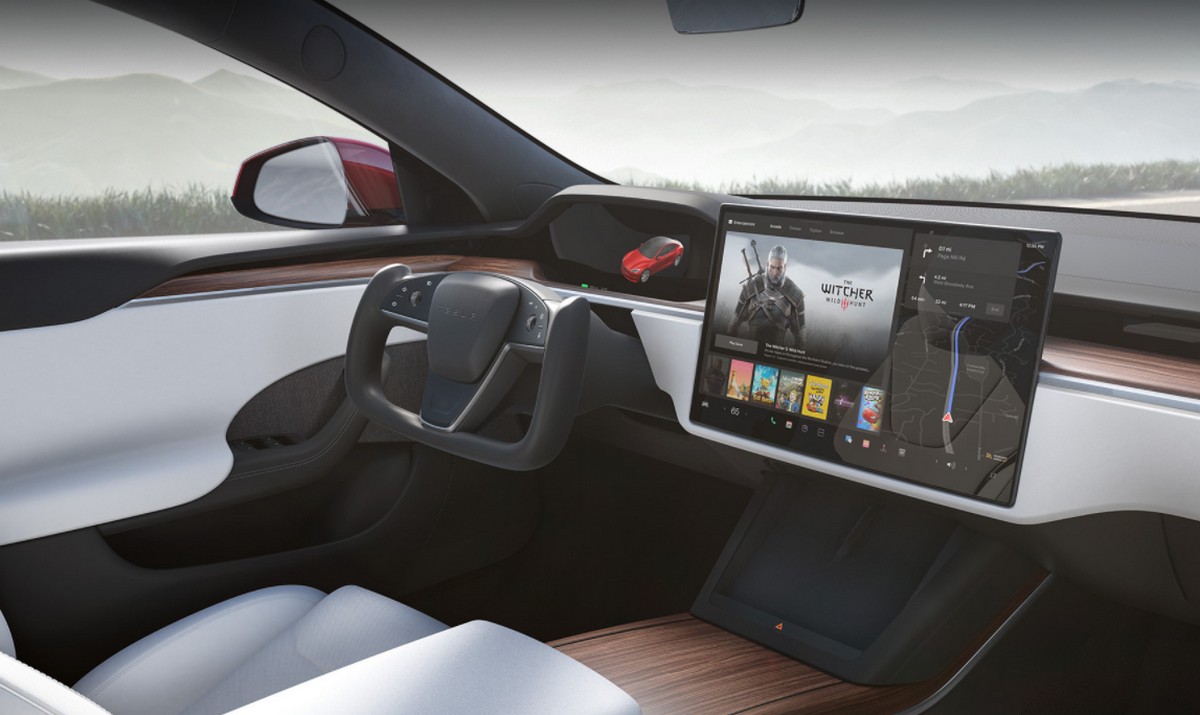 Dans les dernières Tesla Model S et Model X, il est possible de connecter des manettes de jeu sans fil pour jouer depuis n’importe quel siège. © Tesla