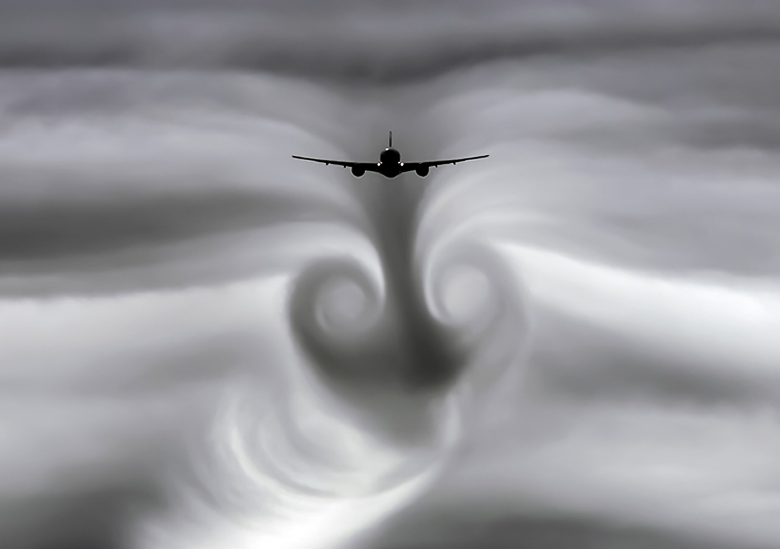 Des turbulences de sillage derrière un avion, un phénomène spectaculaire mais dangereux pour les autres avions. © hlxandr, Adobe Stock